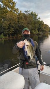 Oklahoma Fishing & Adventure founder Aaron Newton with fish