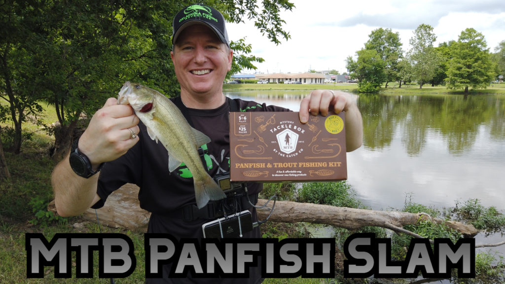 Aaron holding a catch from his panfish slam